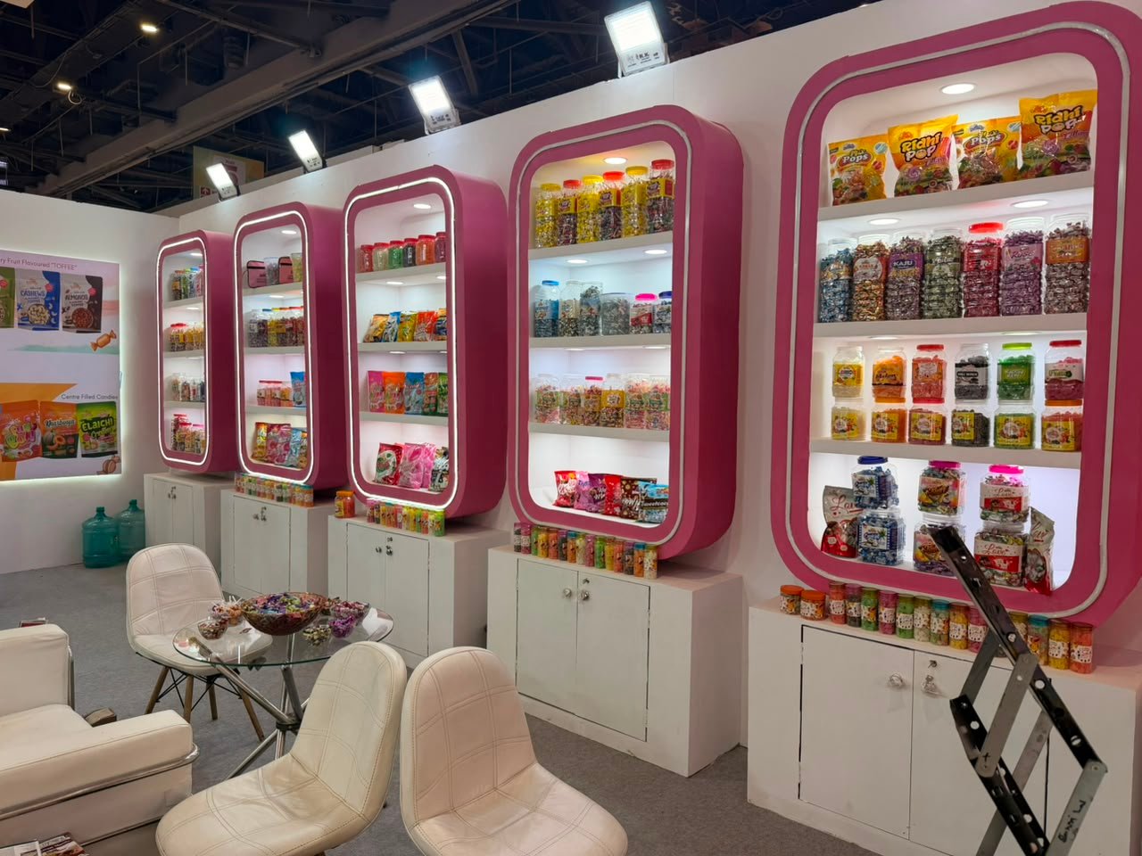 Jars and cartons of Krishna Confectionery products on the stand at AAHAR 2026